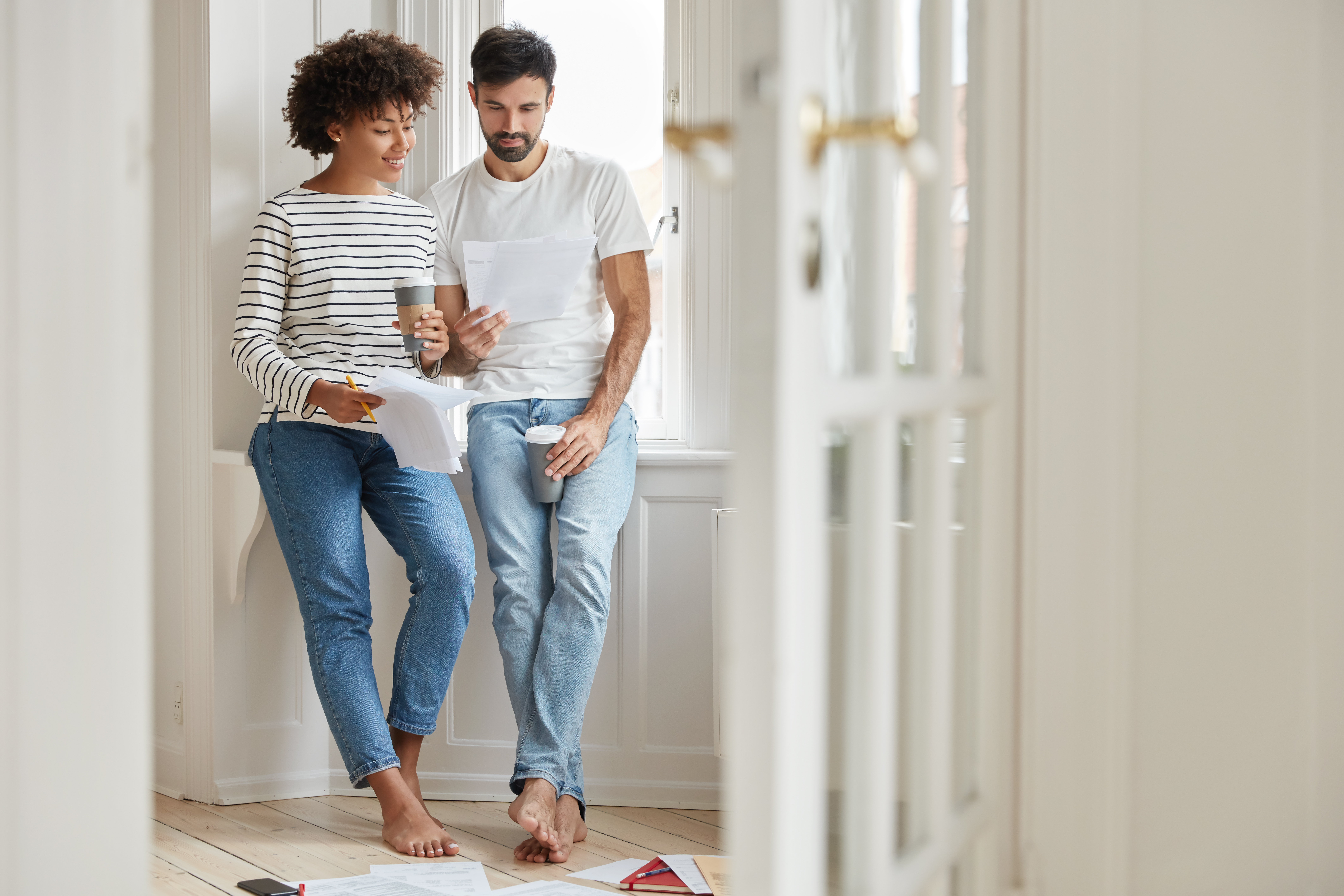 A women and a man celebrating there new home move