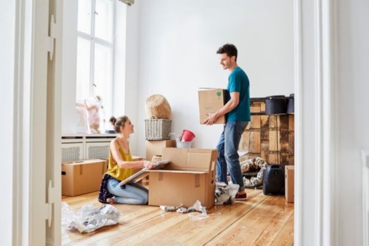 New Home Owners Unpacking boxes