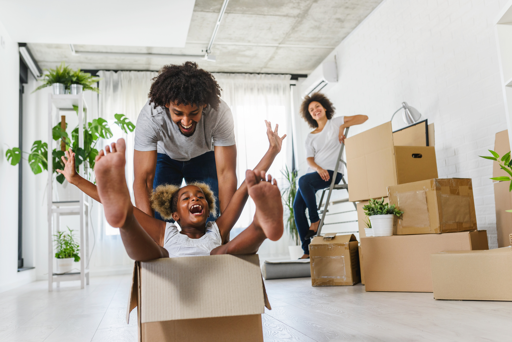 Happy Family moving into there new home